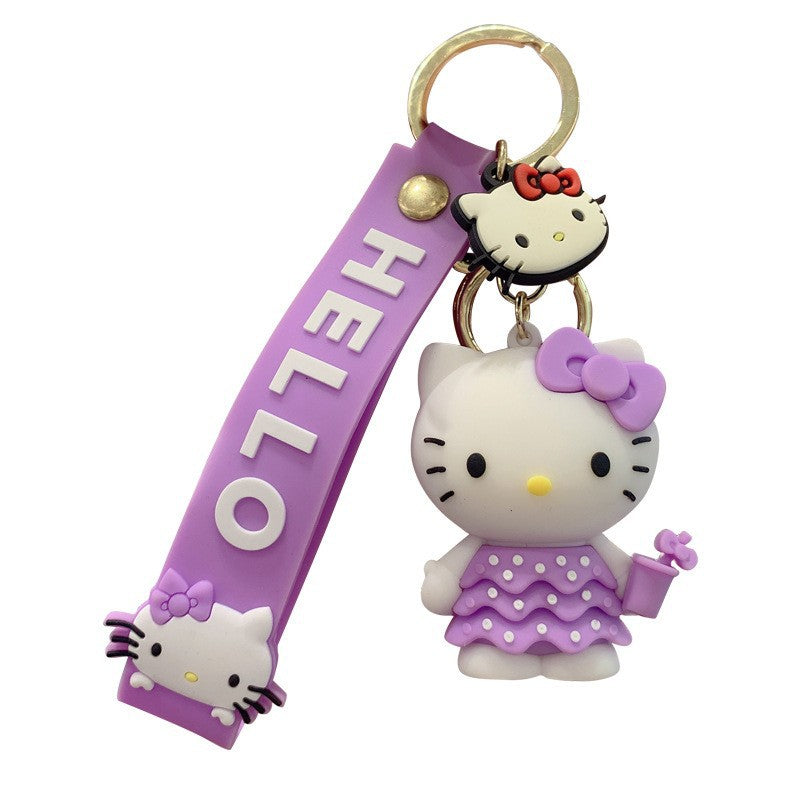 Llavero Goma 3D Sanrio Kitty vestido violeta